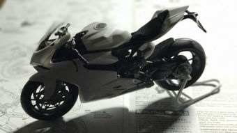 请问田宫的摩托车模型零件已经用胶水粘上了,怎么才能让它无损伤的分离